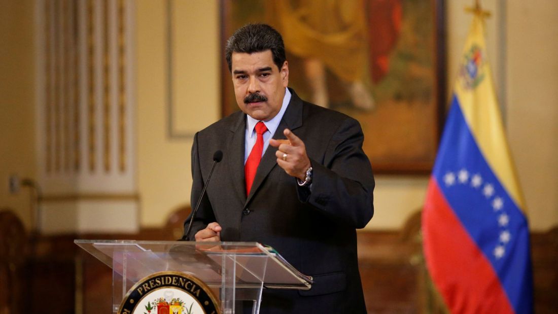 Venezuela’s President Nicolas Maduro gestures as he talks to the media during a news conference in Caracas